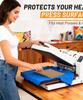 Woman using heat press with Nonstick PTFE Teflon Sheets For Heat Press 16x20 on blue shirt, demonstrating crafting and baking use.
