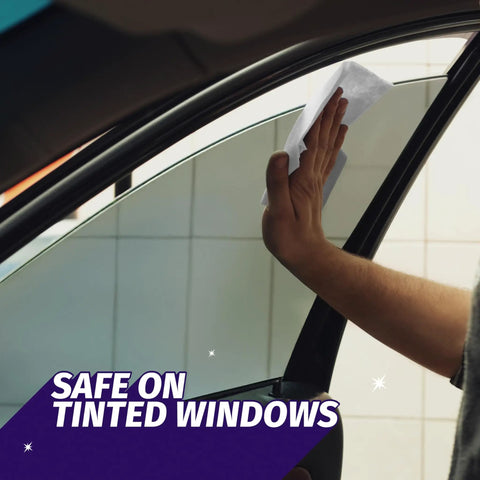 Person using Auto Wipes For Cars And Screens Quick Streak Free Shine Ammonia Free Cleaner Wipes Safe On Tinted Windows And Electronics on car window