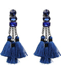 Pair of blue tassel earrings with blue stone embellishments and chain details