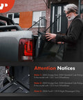 Tailgate Hinge Pivot Bushing Insert Kit For Ford F Series And Dodge Ram Trucks in use on parked pickup truck
