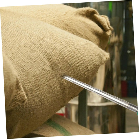 Stainless Steel Grain Sampler Tool With Handy Handle Compact Probe For Corn Rice And Wheat Sampling inserted in burlap sack