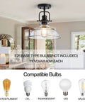 Farmhouse Flush Mount Ceiling Light With Aged Black Metal Frame and Seeded Glass Shade in cozy entryway