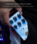 Person holding the Dope Compact Guitar Reverb Pedal With 9 Digital Effects Room Hall Plate Spring Shimmer Cloud Bloom Swell And Lo Fi For Electric Bass And Acoustic Guitars True Bypass Dual Power Metal Enclosure close-up.