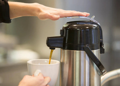 ECAL22S Eco Air Lever Airpot With Glass Vacuum Insulated Beverage Dispenser 2.2 Liter Thermal Coffee Carafe in use