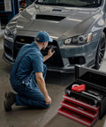 20 Inch Portable Metal Tool Box With Three Drawers And Top Tray, Grab And Go Latch Closed Organizer Chest For Garage, Home And Warehouse, Red And Black, Built Tough For Quick Access And A Clean, Efficient Workspace. mechanic inspecting car