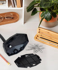 Universal Barcode Scanner Stand With Wall Mount And Built In Compartment, shown disassembled on desk with office supplies.