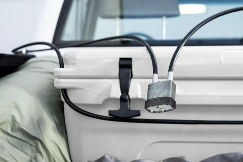 Heavy Duty Padlock With 8 Foot Steel Cable For Outdoor Security locked to cargo area, showcasing weather resistance and security features.