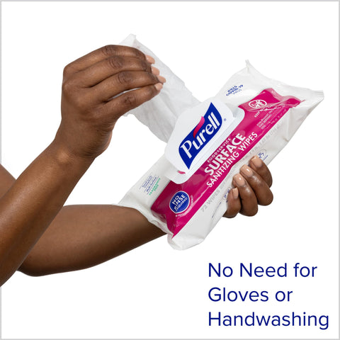 Close-up of hands using Foodservice Surface Sanitizing Wipes Flowpack 7.4 By 9 Inches Durable Thick Wipes 72 Count Pack Of 12.
