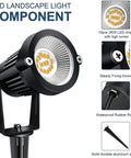 Close-up of Low Voltage LED Landscape Lights 7W 12V spotlight with connectors, showing LED chips, fixing screw, rubber ring, and aluminum stake.