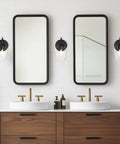 Bathroom interior with Gold Wall Sconce Lighting Set Of 2 With Frosted Champagne Glass Shade beside double mirrors