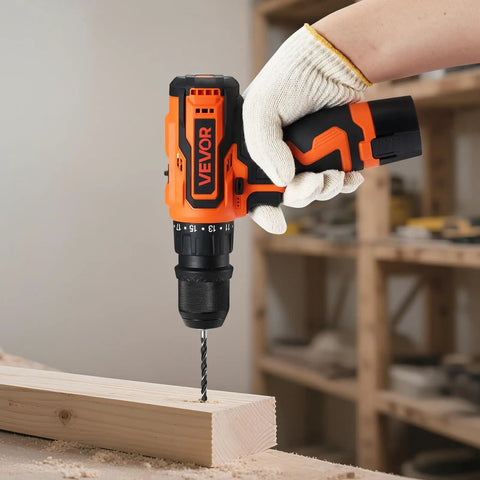 Person using Cordless 5-In-1 Drill Driver Kit With Dual Speed, Quick-Change Chuck, Two Batteries, Charger, on wooden board