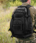 Hiker with Tactical Molle Admin Pouch With Laser Cut PALS Panel Horizontal EDC Tool Bag attached to backpack