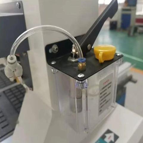 Close-up view of Pro Grade 4x8 CNC Wood Router with vacuum table component, highlighting part of the press roller system.