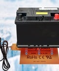 Automotive Silicone Battery Heater Pad With Smart Thermostatic Control And Uniform Heating Wires under a car battery, 60 watt, orange color.