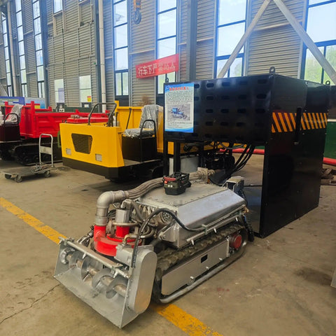 Remote Controlled Pond Dredger With Tracks For Easy Sludge Cleanup in Farm Fish Ponds and Lakes, displayed in factory setting.