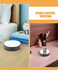 Heavy Duty Motorized Electric Rotating Platform With Remote Control For Jewelry Display on a desk with watches and makeup.