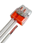 Three-Port Push-In Wire Connector for 12-20 AWG Orange 100-Pack with visible wiring connections