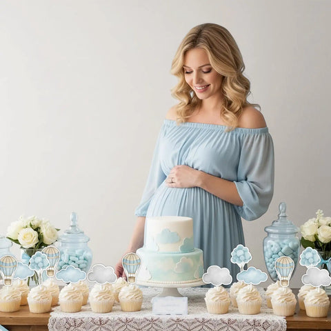 Pregnant woman in blue dress with Adventure Awaits Hot Air Balloon Cupcake Toppers 36 Piece Set Blue Clouds Party Picks