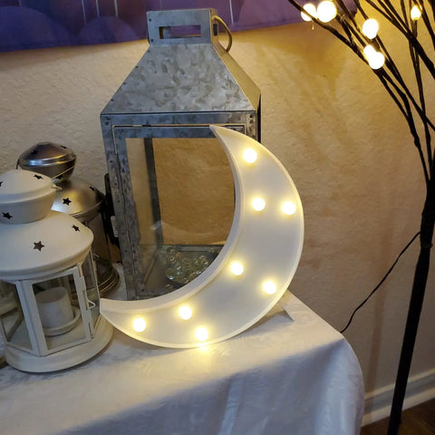 Three Shape Night Light Set Star Moon Cloud Warm White Glow For Kids Room Nursery Decor Lamp Soft Cozy Dreamy Ambience Plastic White Decorative Light For Bedrooms Parties Baby Showers And Gatherings displayed with a glowing moon shape.