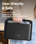 Front view of a black HOTO compact tool kit case with a built-in carry handle, held by a person.