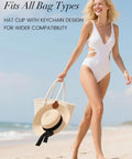 Woman holding bag with Magnetic Hat Clip For Travel On Bag Made From Genuine Leather With Strong N52 Magnet Keeps Your Hat Secure