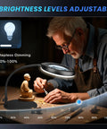 Man using 12X Magnifying Glass With Light And Stand For Crafting 5 Color Modes 9 Level Dimmable 144 LED Desk Lamp Hands Free