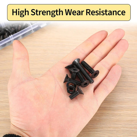 161 PCS M6 Countersunk Bolts Kit Including Flat Head Machine Screws and Nuts Hex Socket Carbon Steel Rust Resistant Heavy Duty Hardware Assortment Pro Grade Badass Quality for DIY Mechanics showing black flat head screws in hand.