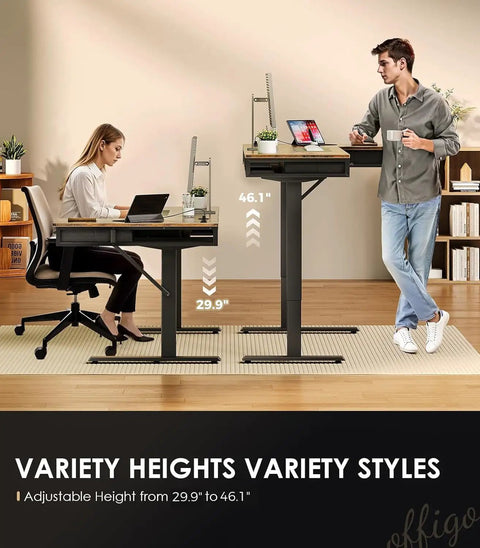 Two people using 63 Inch L Shaped Electric Standing Desk With Four Fabric Drawers For Home Office Corner Setup Provides Extra Storage And Power Outlets Height Adjustable Sit Stand Table In Rustic Brown, showing adjustable height feature