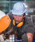 Worker wearing Anti Fog Safety Goggles For Men And Women With Blue Light Blocking UV Protection Dust Resistant Coating Scratch Resistant Lenses Pink Frame