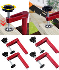 Woodworking Workbench Dog Clamps for 19mm and 20mm Holes, Aluminum Holdfasts in red, demonstrating quick-release mechanism.