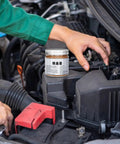 Copper Paste Anti Seize Lubricant For Heavy Duty Automotive Use High Temperature Multipurpose Paste in mechanic's hand on car engine