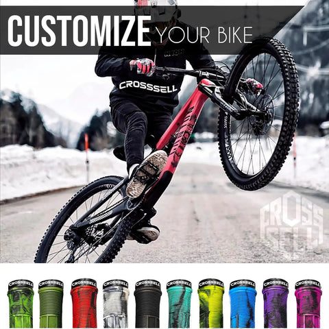 Cyclist performing wheelie with Dual Color Lock On MTB Grips For Mountain Bike BMX And E Bike Non Slip Shock Absorbing Grips