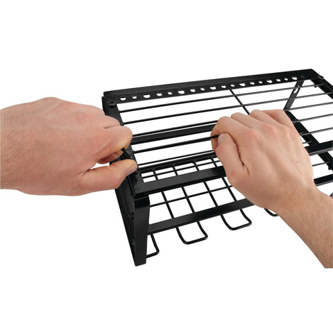 Kickin Heavy Duty 3 Tier 16 Inch Wall Mount Power Tool Organizer being assembled by hand, showing iron frame and hooks