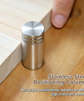 Pro Grade 20mm Bench Dogs Set With 38mm Rise For MFT Workbench next to wooden surface, stainless steel finish