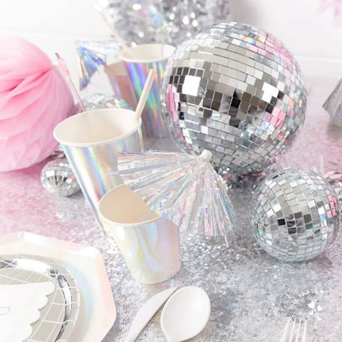 11 Piece Disco Ball Cake Decorations Set With Mirror Ball Toppers For Cakes And Party Tables Includes 4 Sizes 8cm 6cm 4cm And 2cm Perfect 70s Theme Birthday Centerpiece And Disco Dance Party Decor arranged on silver sequin tablecloth with cups and pink decor