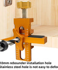 Close-up of No Sweat Cabinet Door Installation Clamp with Adjustable Positioner showing precise alignment for hinge installation.