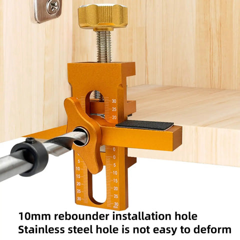 Close-up of No Sweat Cabinet Door Installation Clamp with Adjustable Positioner showing precise alignment for hinge installation.