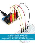 Extensive 560 Pcs Jumper Wire And Breadboard Kit With 2.54mm connectors and alligator clips connected to breadboard.
