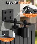 Heavy Duty Sliding Gate Guide Roller Hardware Kit with 3 Inch Black Nylon Wheels and Steel L Bracket installed on gate
