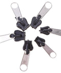 Six Black Universal Zipper Repair Kit Sliders Instant Fix for Jackets Bags and Pants Replaces Damaged Zippers Quickly With Durable Fasteners That Last, showing six black lightweight sliders arranged in a circle on a white background.