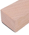 Four Pack Wooden Door Stops With Non Slip Wedge Grip in beech wood close-up view showing smooth texture for home and office use.