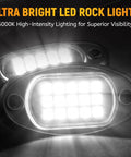 Close-up of illuminated 12 Pod White Rock LED Underglow Lights Kit 6000K Pure White IP68 Waterproof with high-intensity lighting
