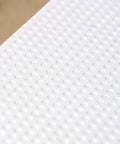Close-up of micro dot surface on Knockout Rock Solid Micro Dot Drill Press Table Kit with textured pattern.