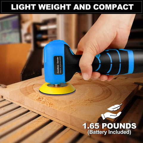 Compact Cordless Palm Sander With 16.8V Battery And 3 Inch Pad for easy wood sanding shown in hand on wood surface.