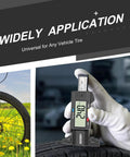 Close-up of Digital Tire Tread Depth Gauge With Large LCD Display measuring tire depth, showing 0.25 on screen.