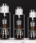 Smooth Sippin Cold Brew Drip Coffee Maker With Stainless Filter And Adjustable Flow Yields Barista Style Drinks Via Glass Carafe On Acrylic Stand makes 3-6 cups.