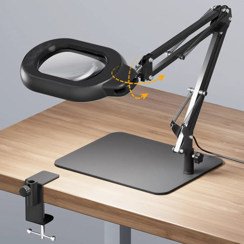 Crystal Clear 10X Square Magnifying Desk Lamp With Dimmable LED Light Clamp Or Base Mount No Nonsense Adjustable Swing Arm For Close Work Reading Tiny Print Crafting Black For Precision Tasks At Home Or Studio, shown with clamp and base on desk.