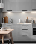Modern kitchen with matte black cabinet pulls 25 pack, 5.5 inch length with 5 inch hole spacing, installed on gray cabinets.