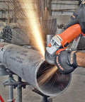Worker using a stainless steel grinding and cutting wheel 6 inch A-30-SS with round hole for smooth finishing on metal pipe.