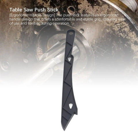 Ergonomic black push stick for table saws with ABS construction against a circular saw backdrop.